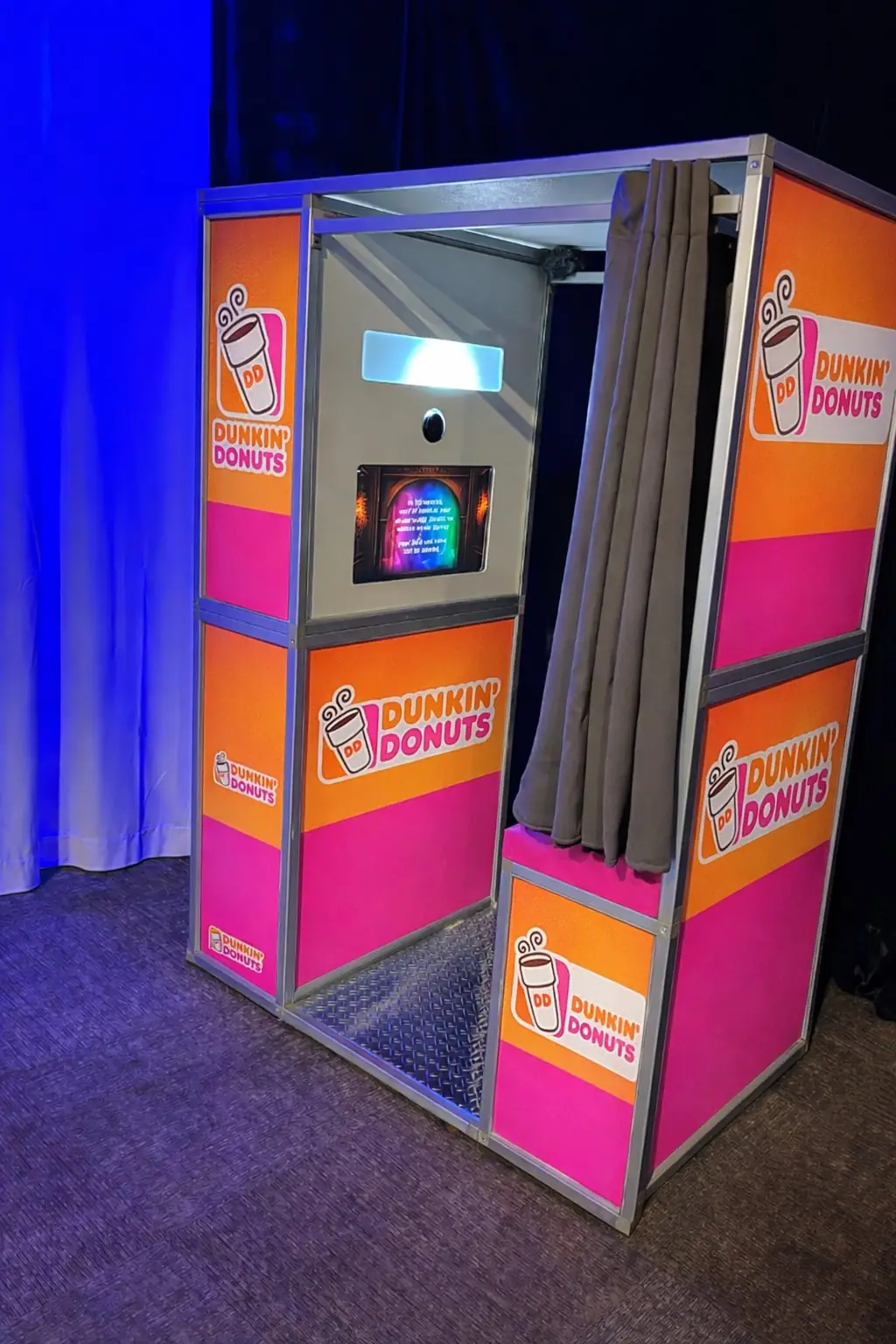 MojoHaus enclosed photo booth wrapped in Dunkin' Donuts branding