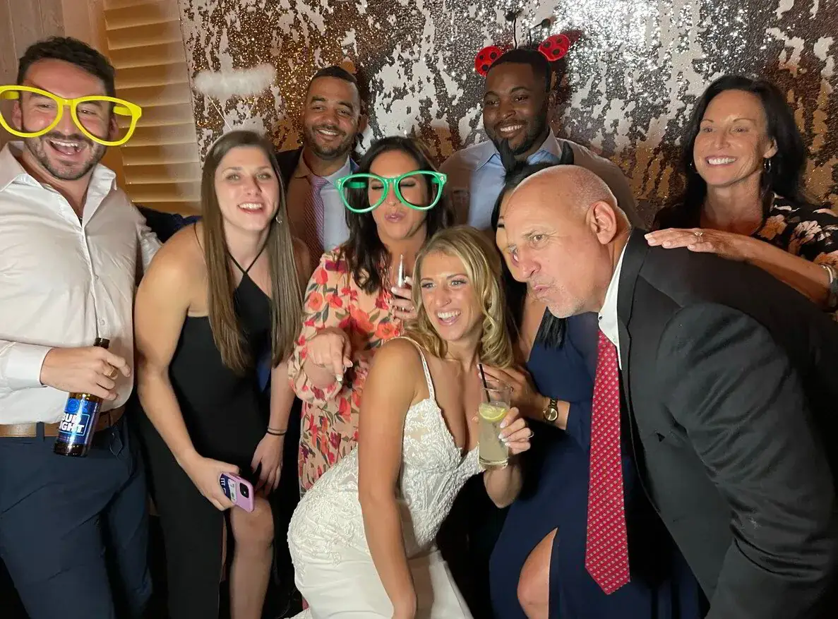 Bridesmaids at a wedding photo booth