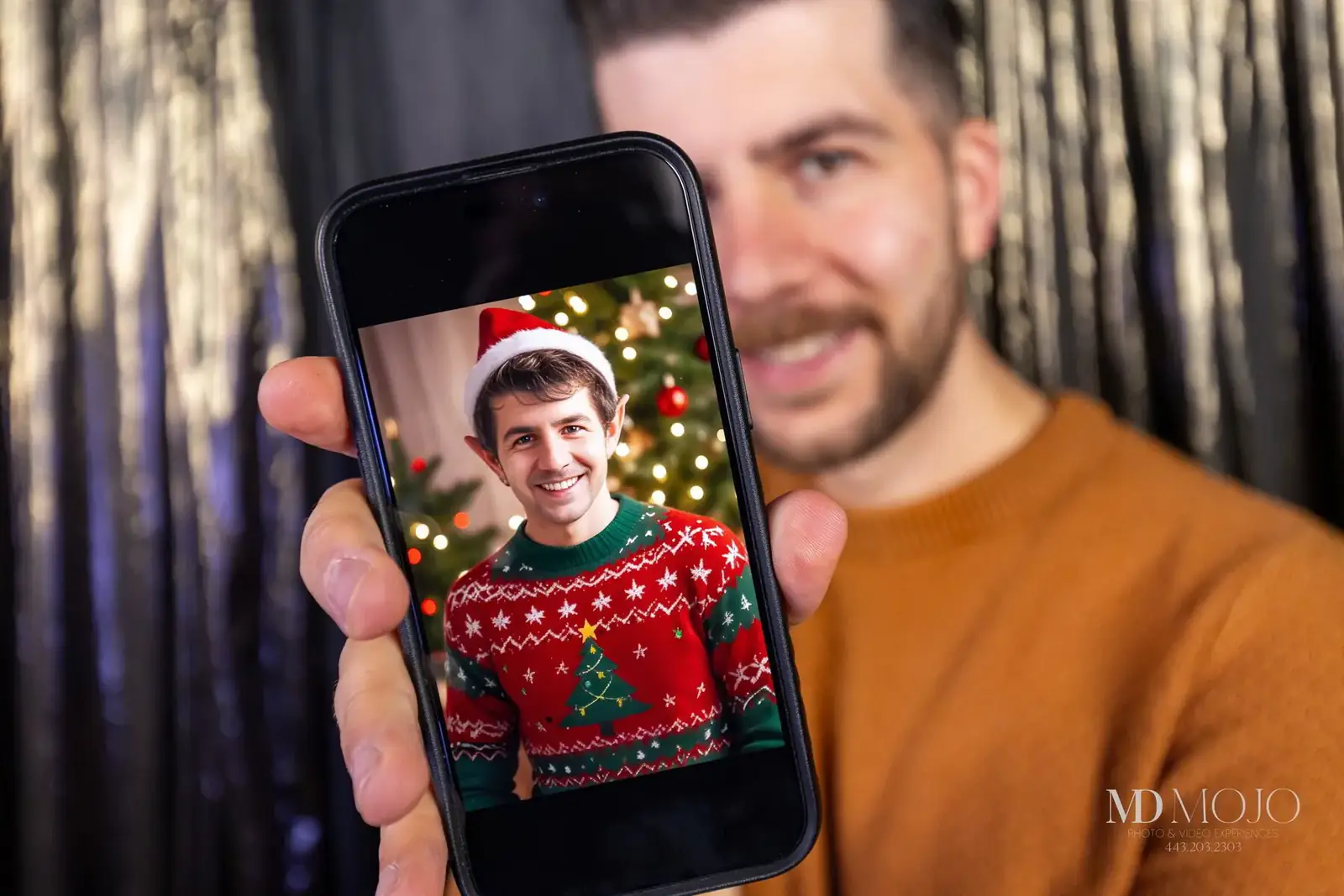 A guest with the AI portrait generated from their selfie at a Maryland event