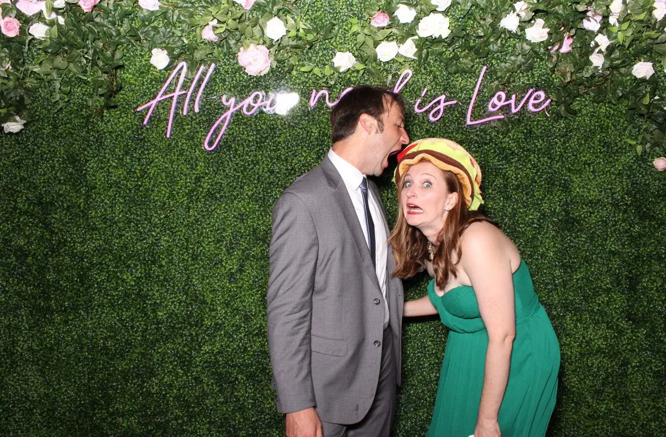 Couple enjoying the selfie photo booth
