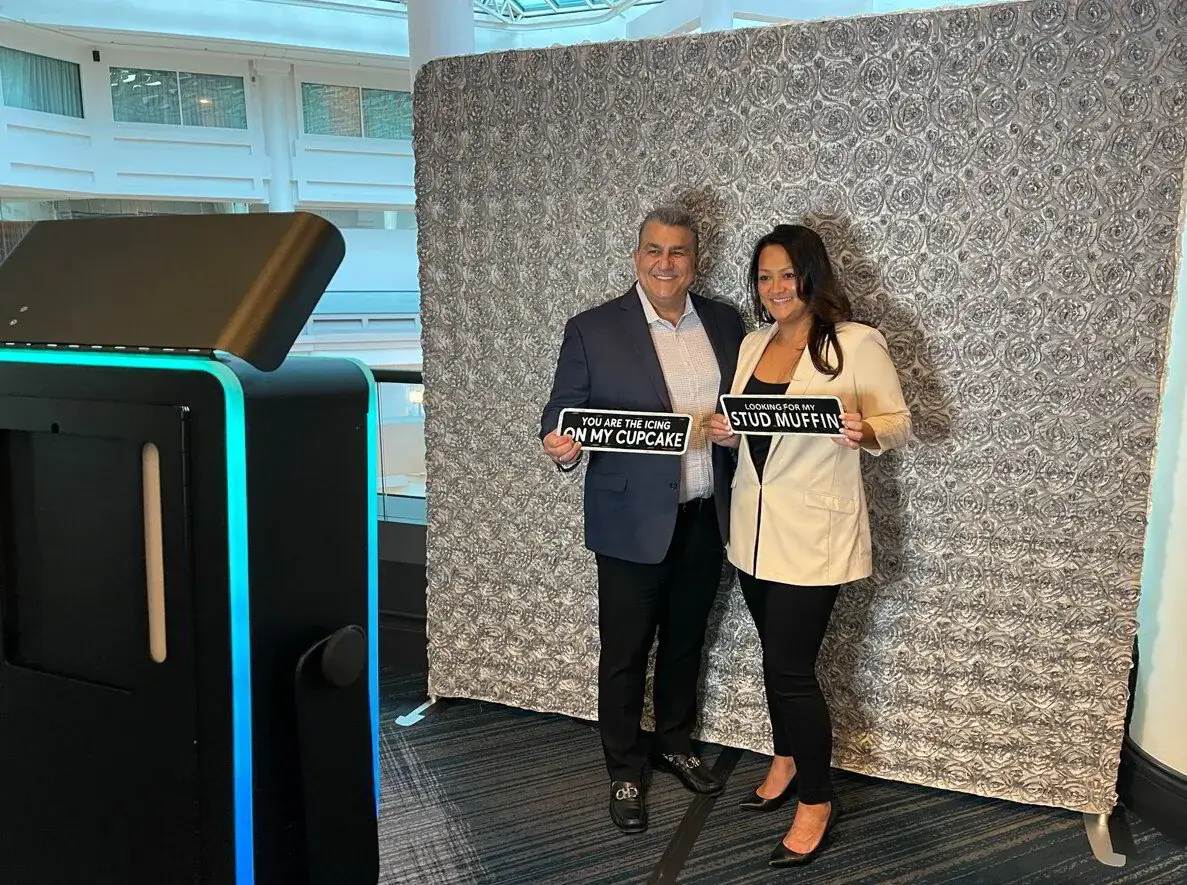 Guests at a corporate photo booth