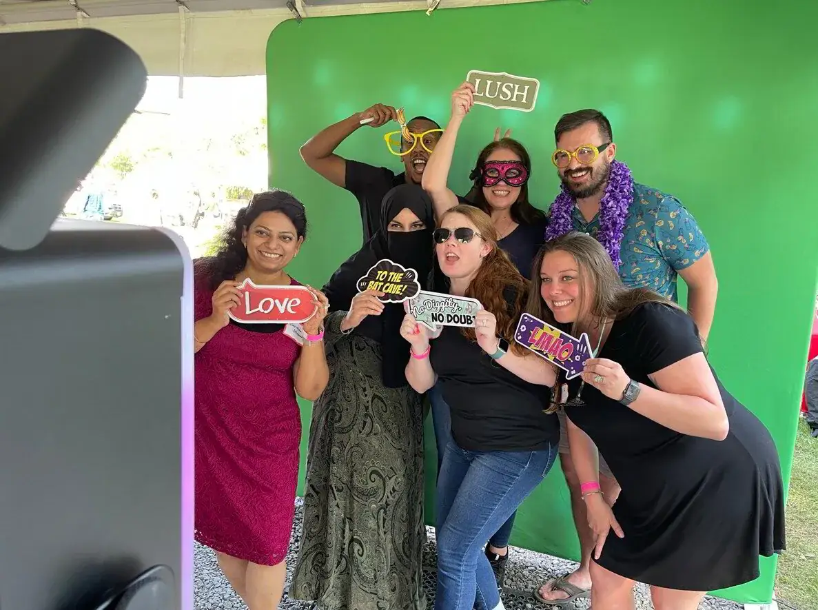 Guests at an MD Mojo photo booth
