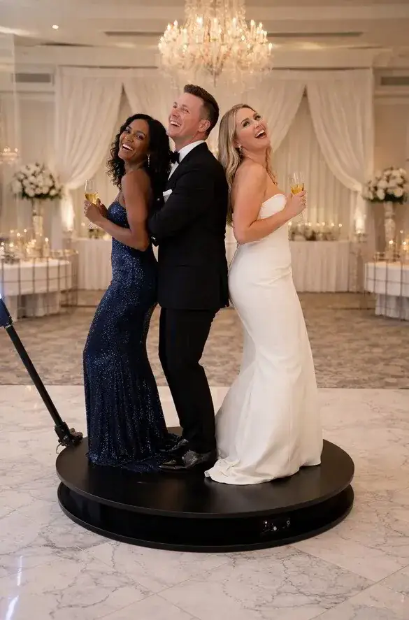 Wedding guests enjoying the 360 photo booth